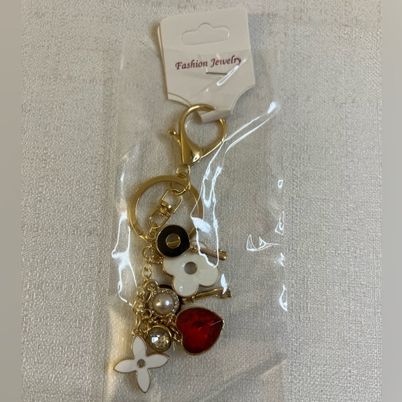 Gold-tone keychain bag charm floral design and key accents - Picture 9 of 9